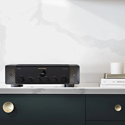 Marantz amplifier connected to a vinyl turntable setup
